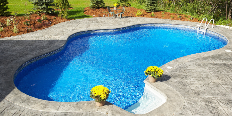 How Surface Skimming Helps Pools With Curves, Steps, and Landscaping
